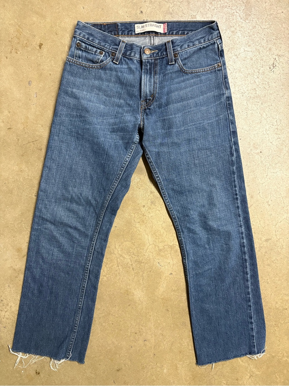 Levi's Slim Straight Jeans in Medium Blue Denim